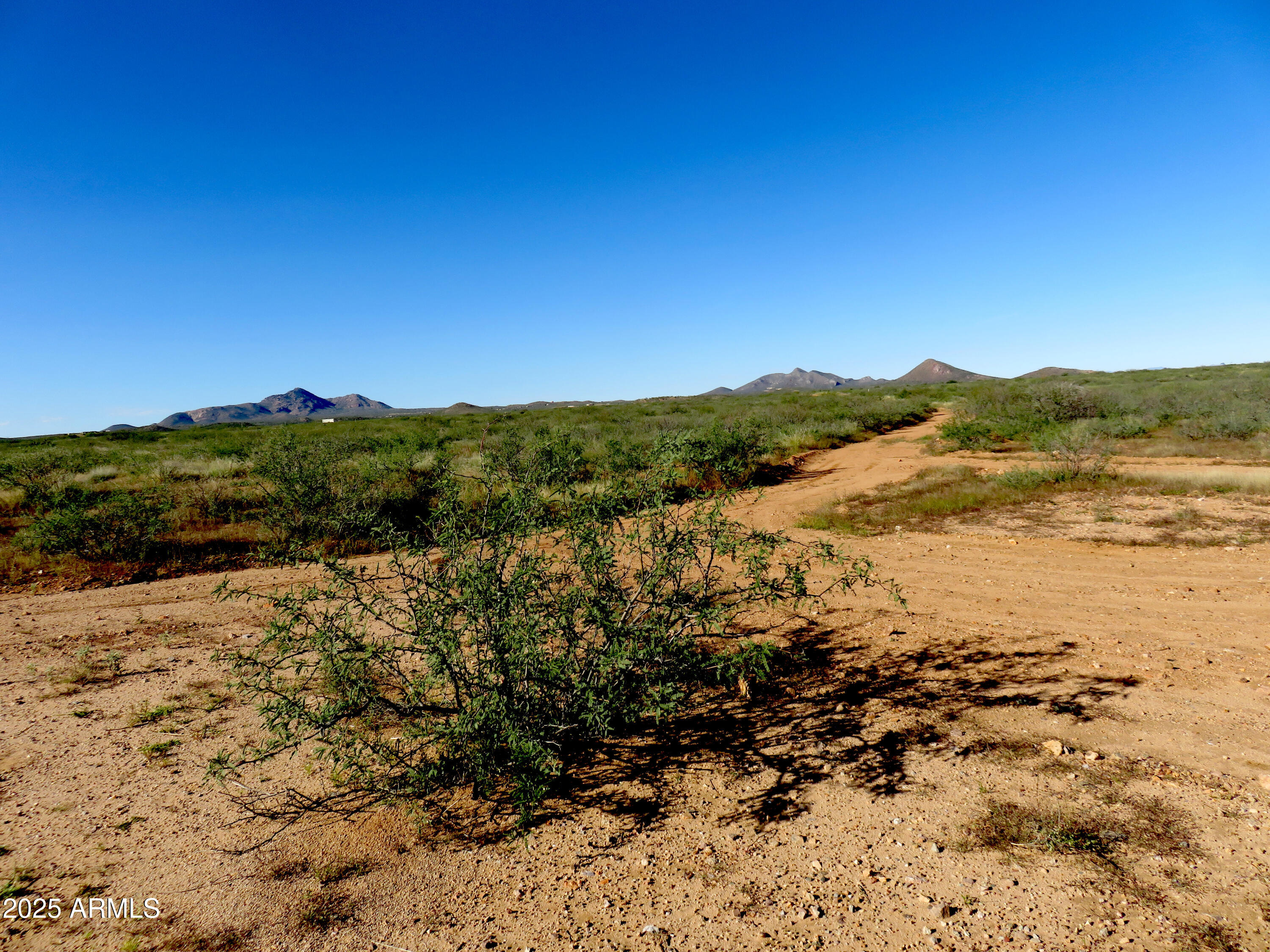 a view of lake and mountain