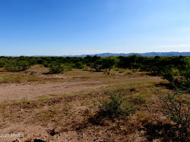 a view of water covered with snow in outdoor space