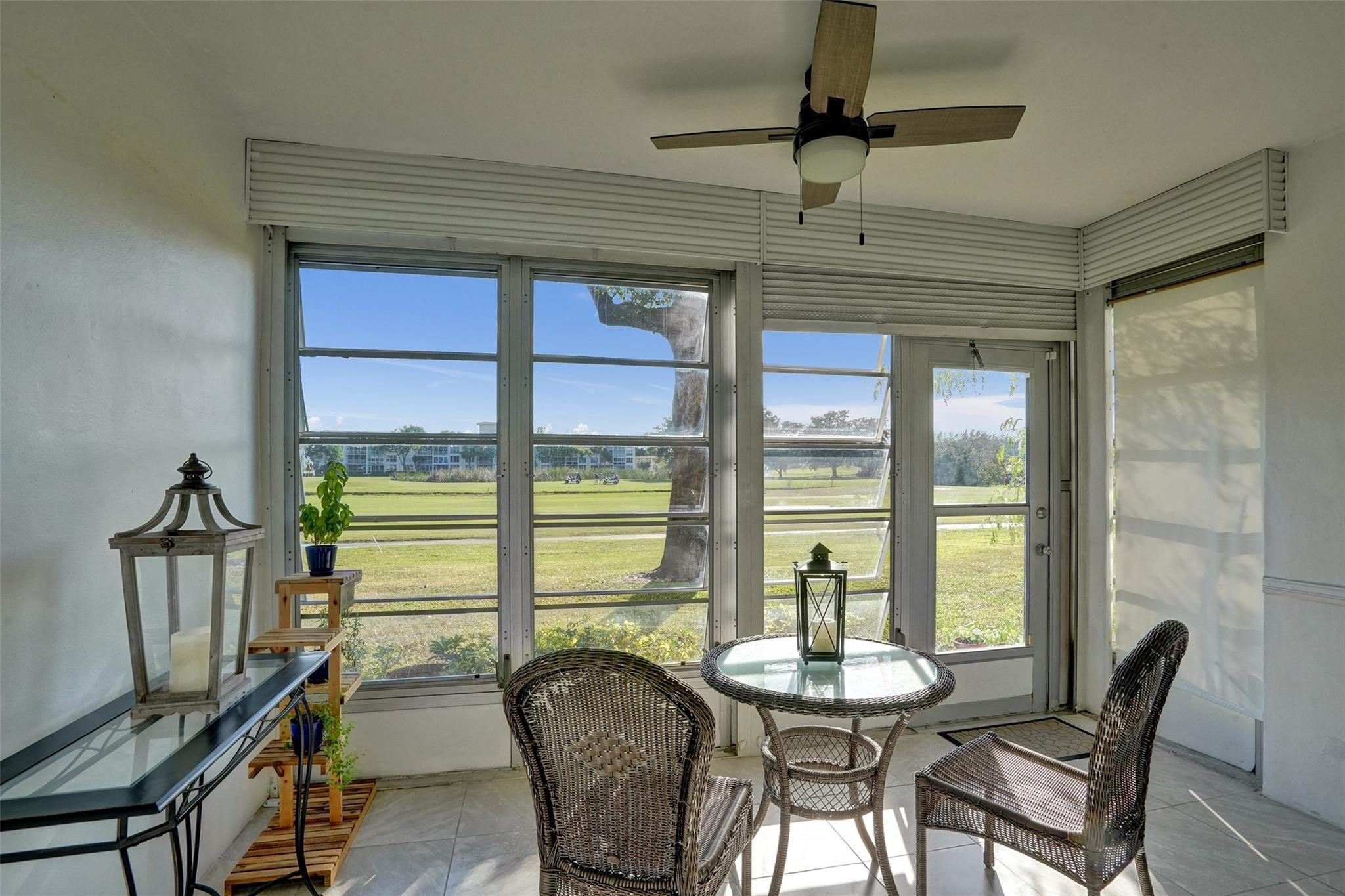 3001 South Course Drive, Unit 107 Pompano Beach, FL 33069 - Photo 34 of 47 a dining room with furniture and window