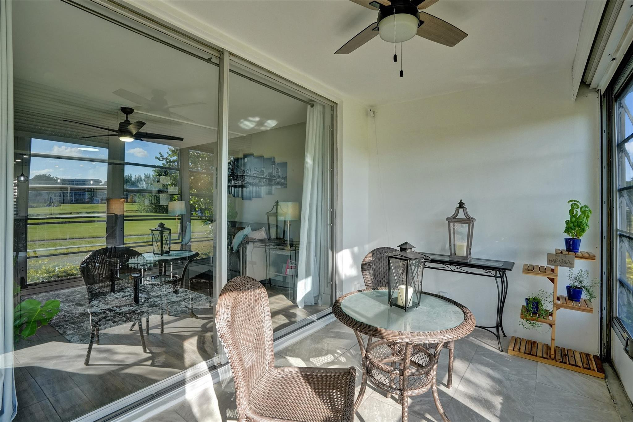 3001 South Course Drive, Unit 107 Pompano Beach, FL 33069 - Photo 36 of 47 a room with furniture and a window