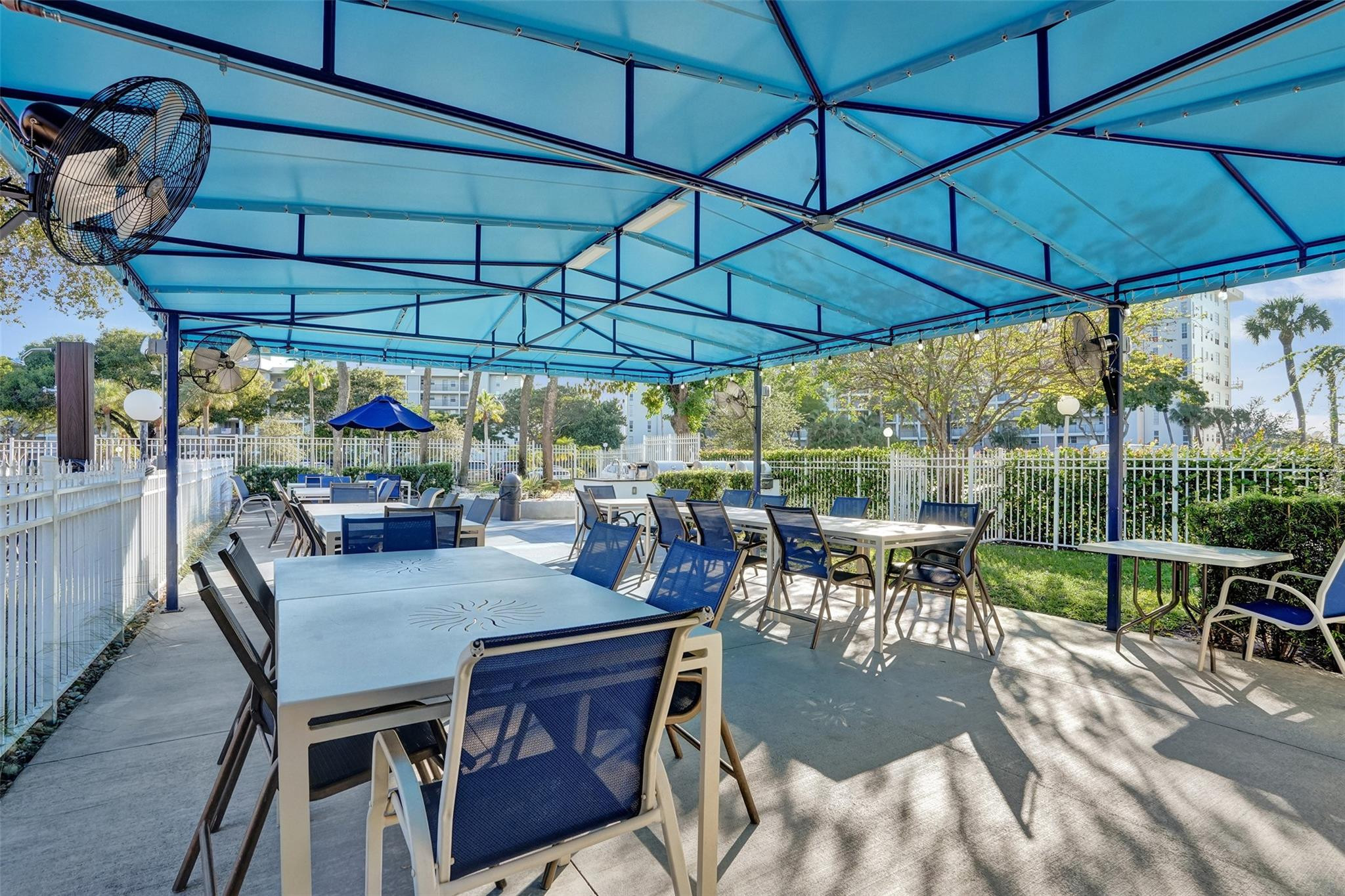 3001 South Course Drive, Unit 107 Pompano Beach, FL 33069 - Photo 38 of 47 a view of outdoor space yard and patio