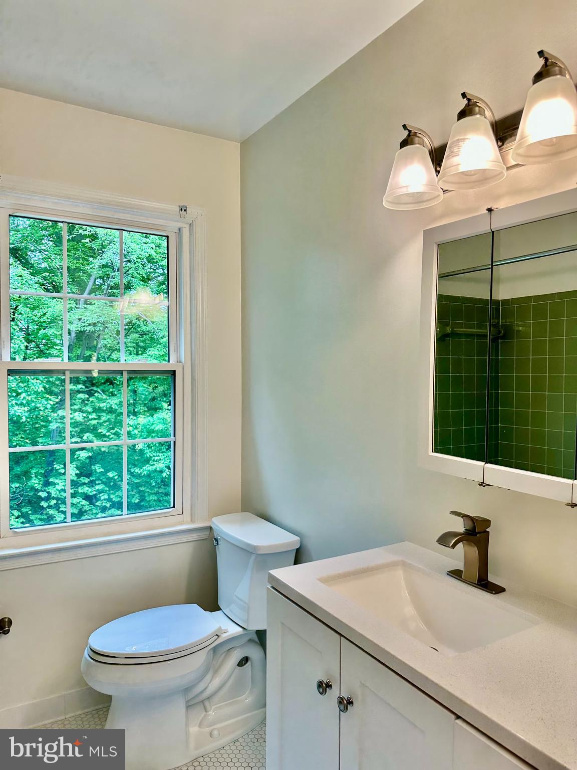 5230 Lonsdale Drive Springfield, VA 22151 - Photo 16 of 25 a bathroom with a sink a toilet and tub
