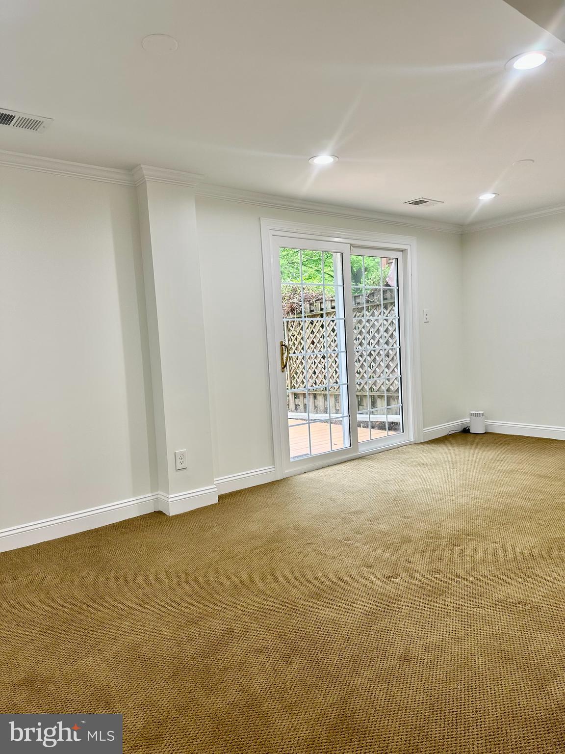 5230 Lonsdale Drive Springfield, VA 22151 - Photo 18 of 25 a view of an empty room with a window