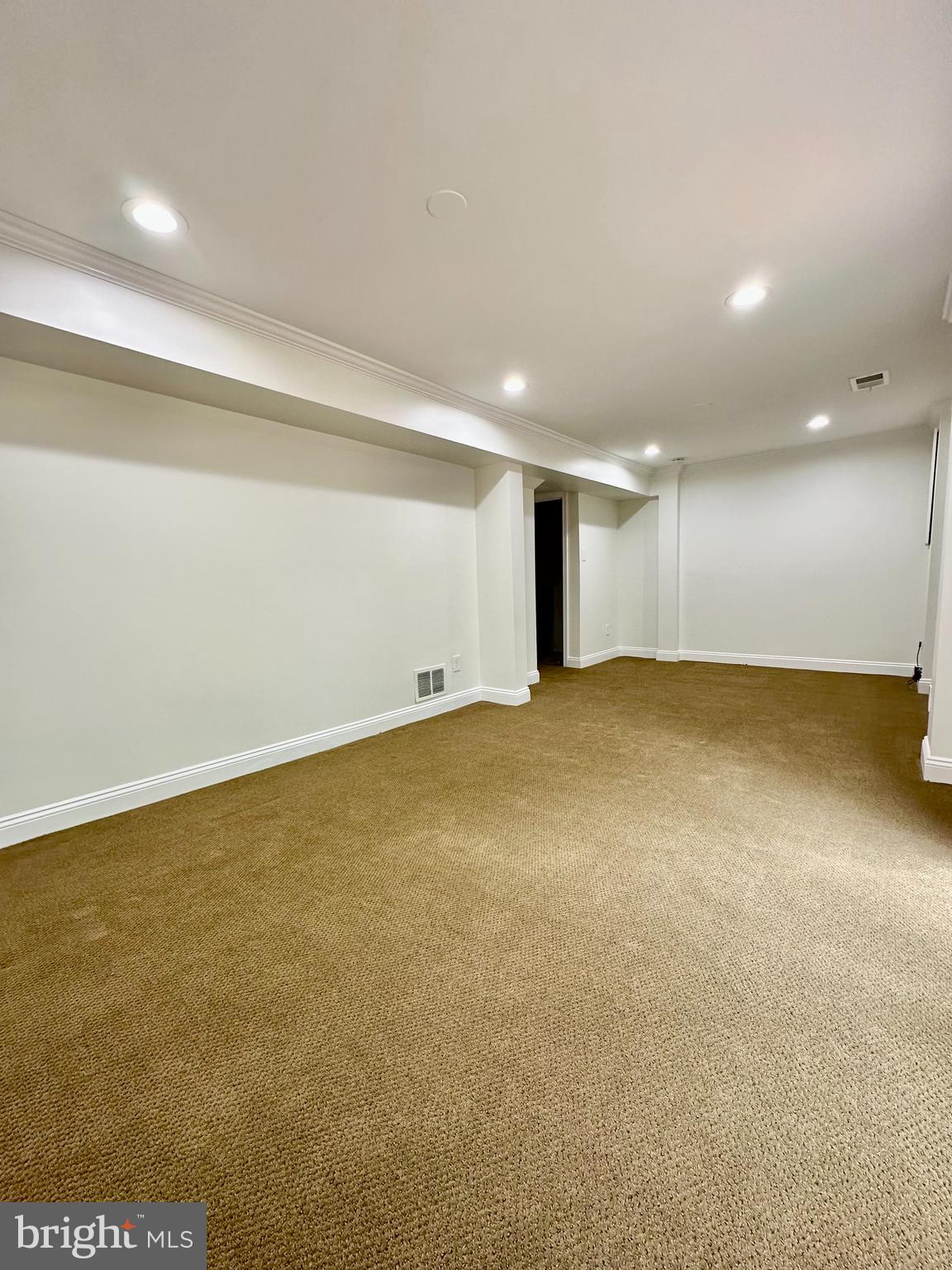 5230 Lonsdale Drive Springfield, VA 22151 - Photo 20 of 25 a view of an empty room with a window