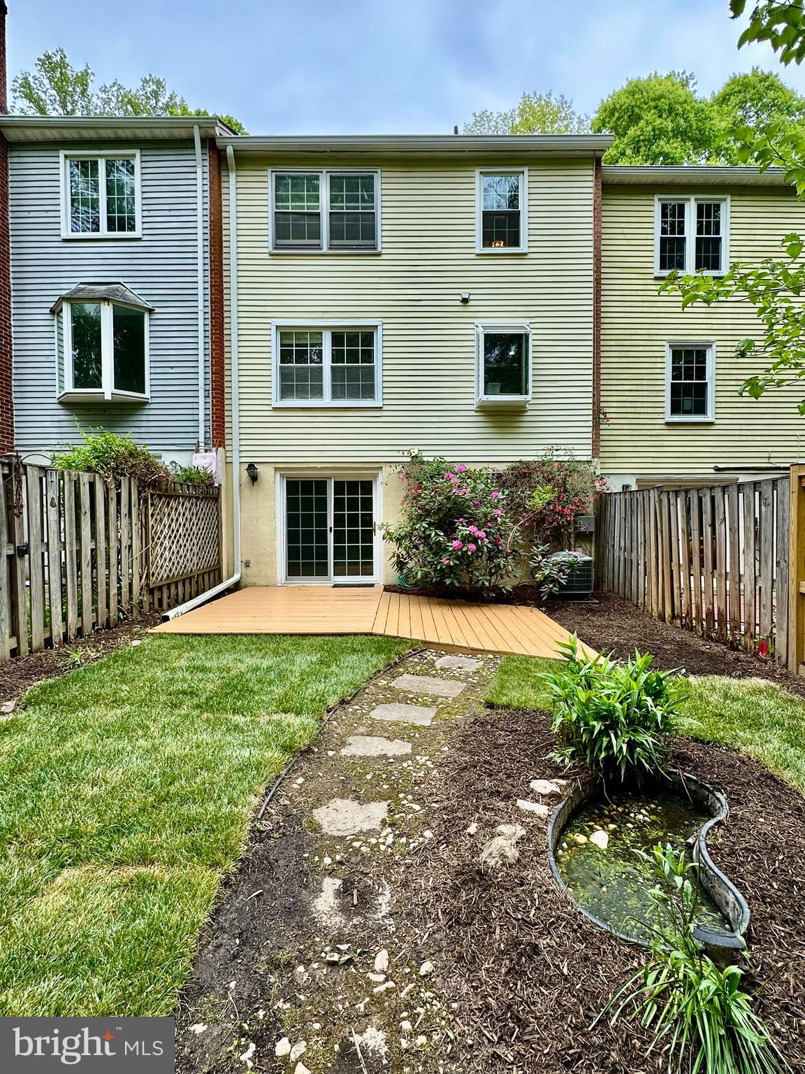 5230 Lonsdale Drive Springfield, VA 22151 - Photo 22 of 25 a front view of a house with garden