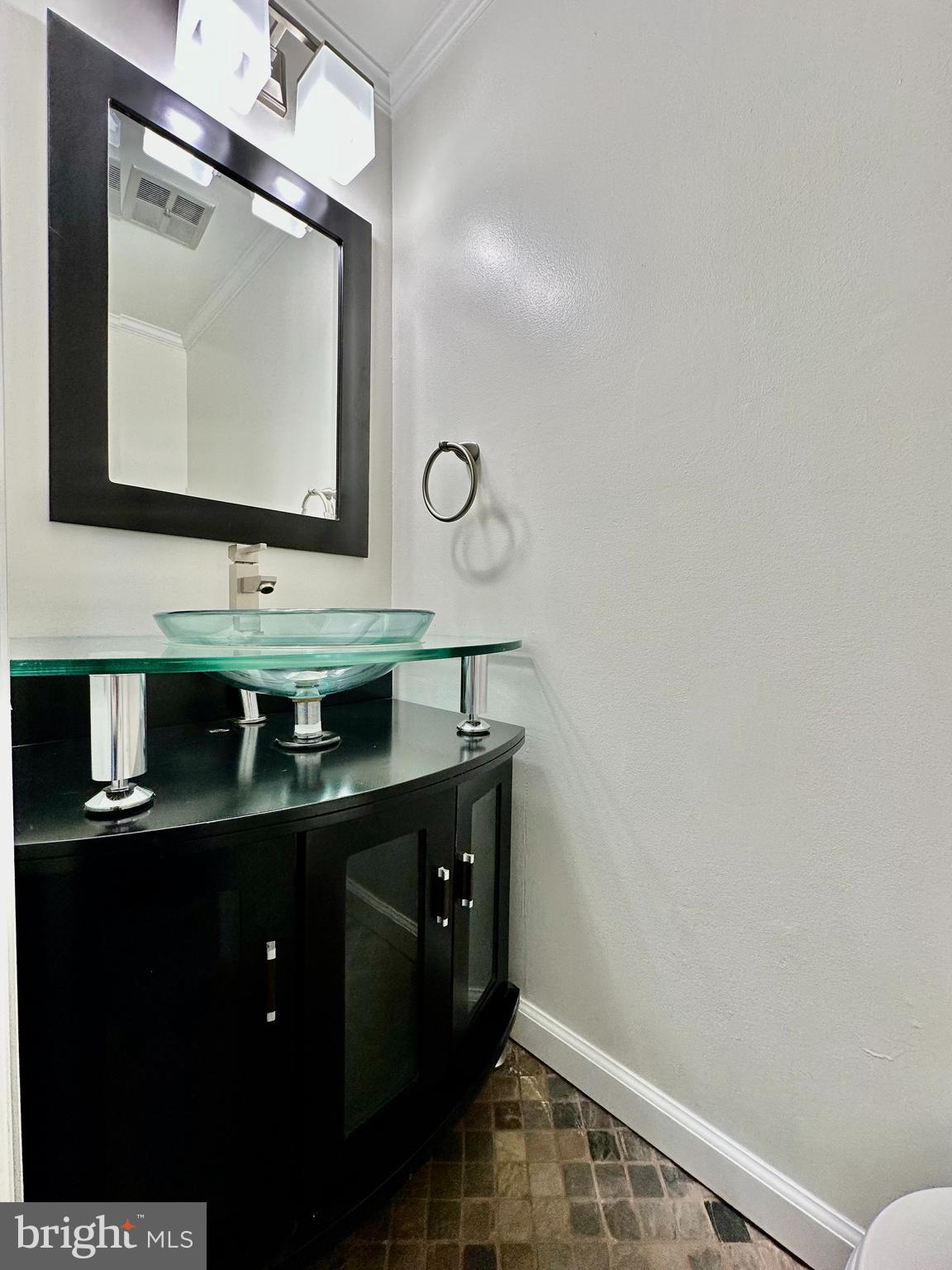5230 Lonsdale Drive Springfield, VA 22151 - Photo 10 of 25 a bathroom with a sink vanity and mirror