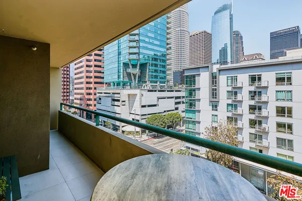a view of swimming pool from a balcony