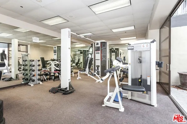 a view of a room with gym equipment