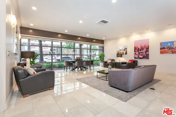 a view of a living room and a chandelier
