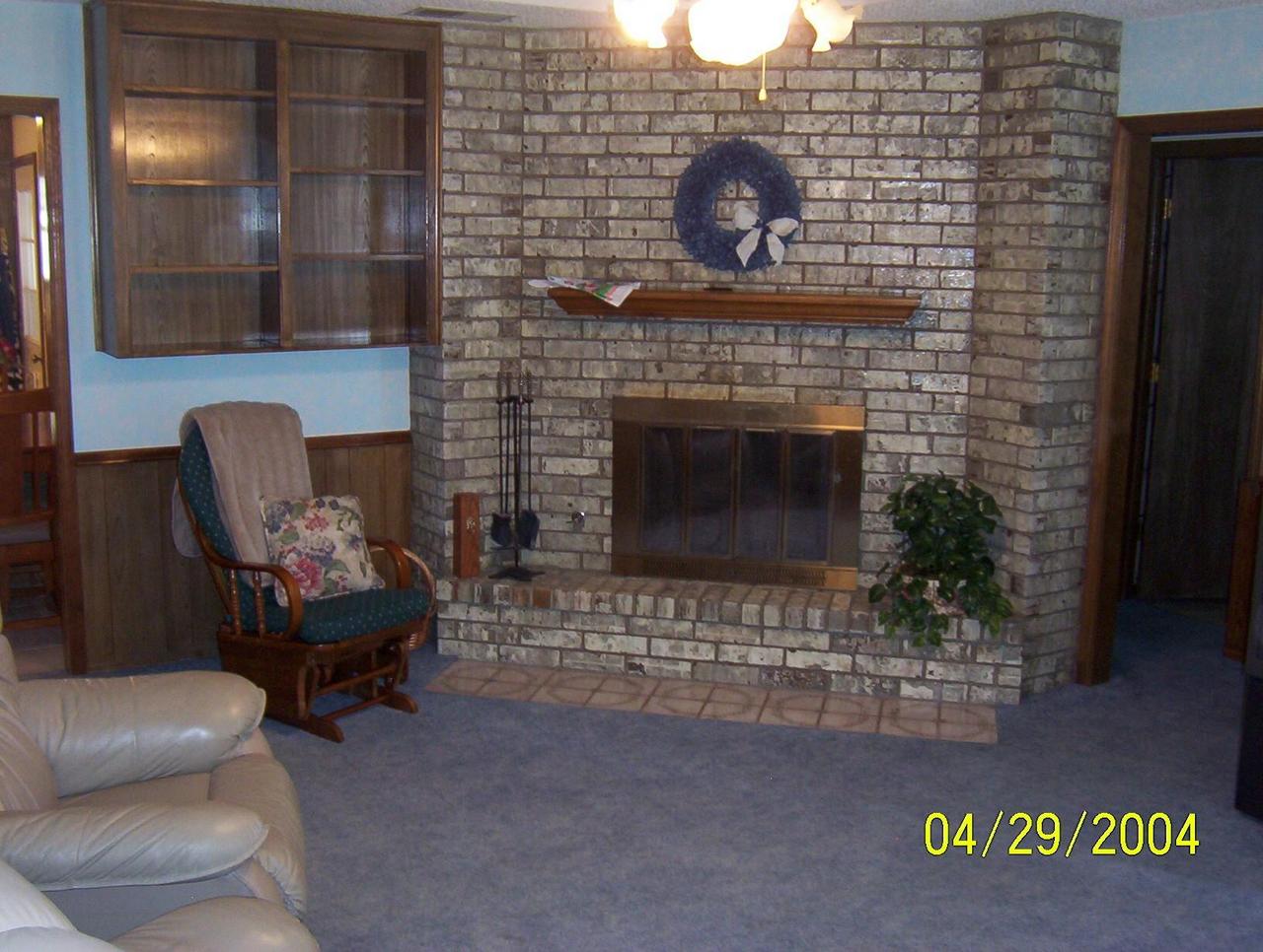 8111 Leah Trail Amarillo, TX 79110 - Photo 3 of 3 a living room with furniture and a fireplace