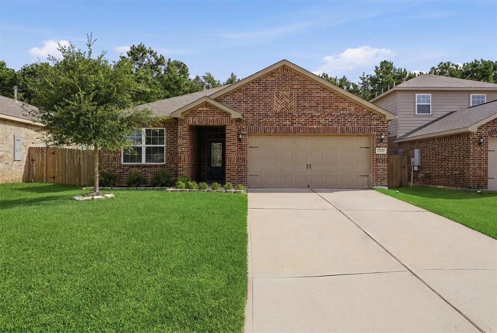 7707 Boulder Sunstone Lane Conroe, TX 77304 - Photo 1 of 26