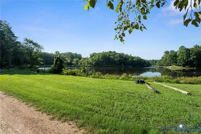 a view of a garden with a lake
