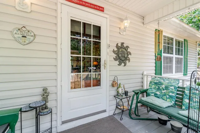 a view of a livingroom with furniture and windows