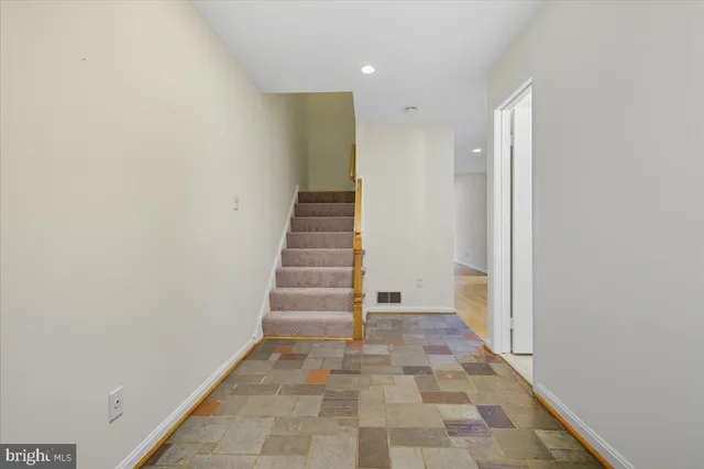 a view of entryway with stairs