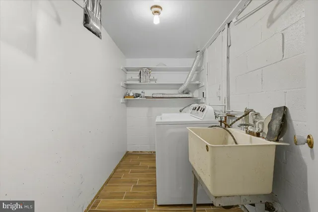 a bathroom with a sink and mirror