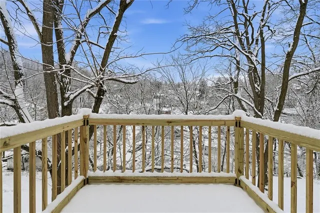 an empty room with a bench