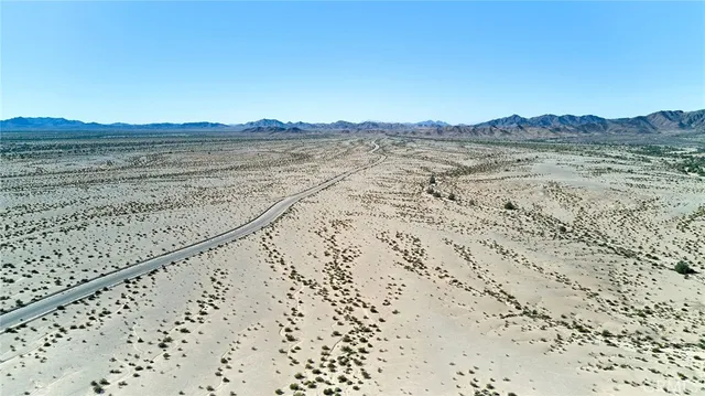 a view of ocean and mountain