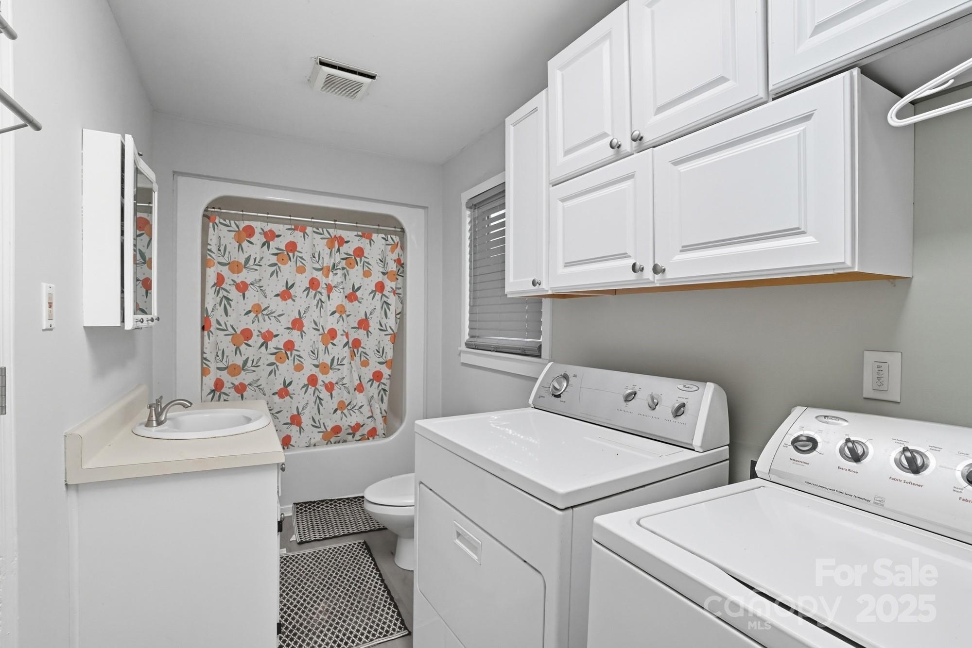 2729 South Ridge Avenue Concord, NC 28025 - Photo 13 of 19 a utility room with dryer and washer