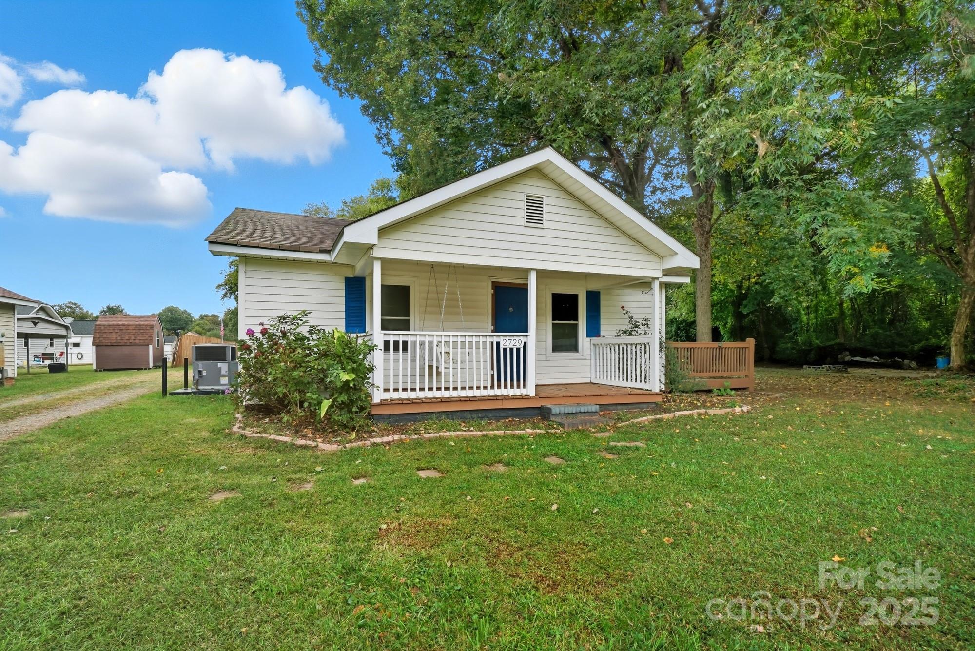 2729 South Ridge Avenue Concord, NC 28025 - Photo 2 of 19 a front view of house with yard and green space
