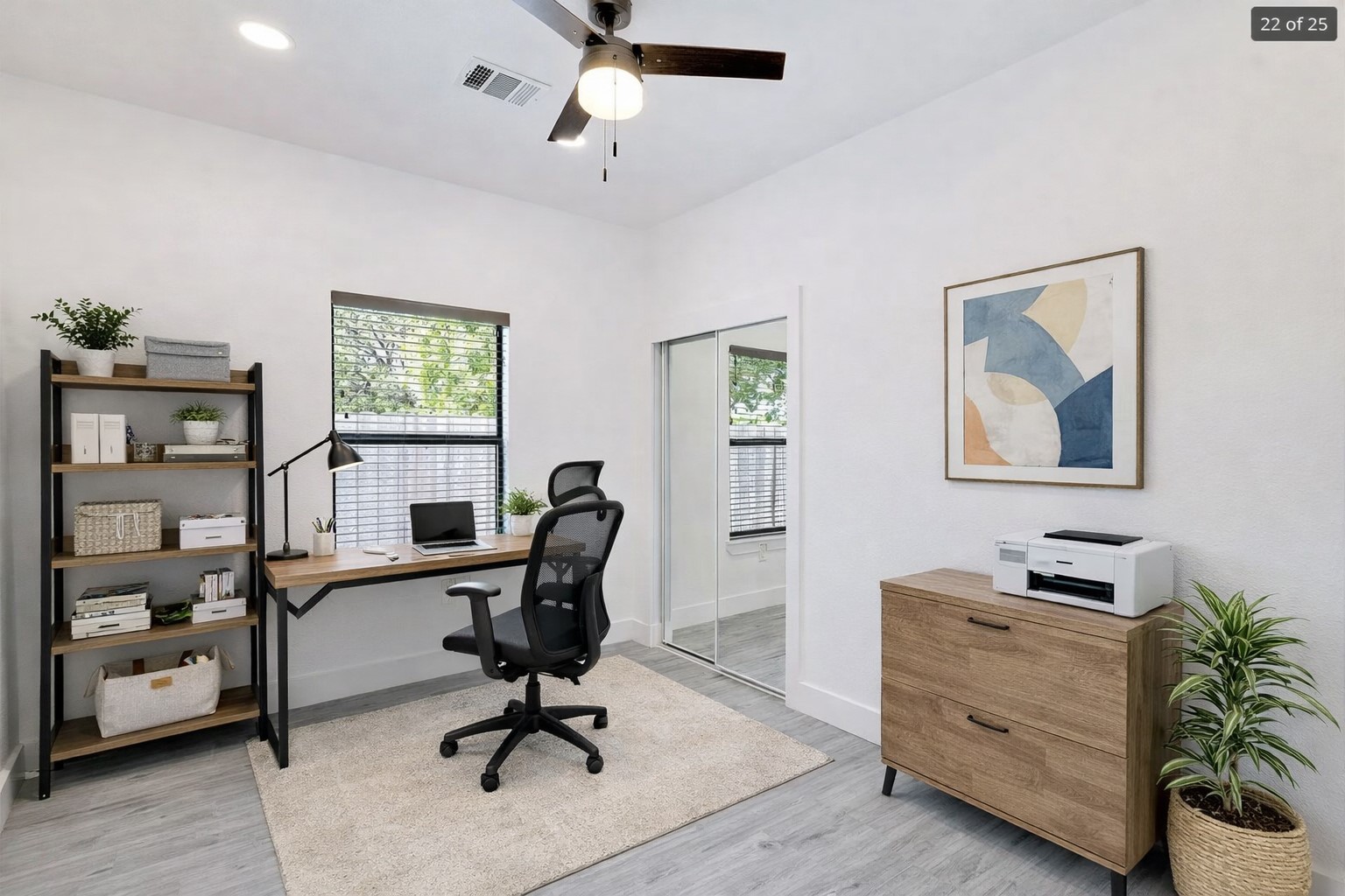 314 Saxon Lane Austin, TX 78741 - Photo 10 of 24 a view of a workspace with furniture and a window