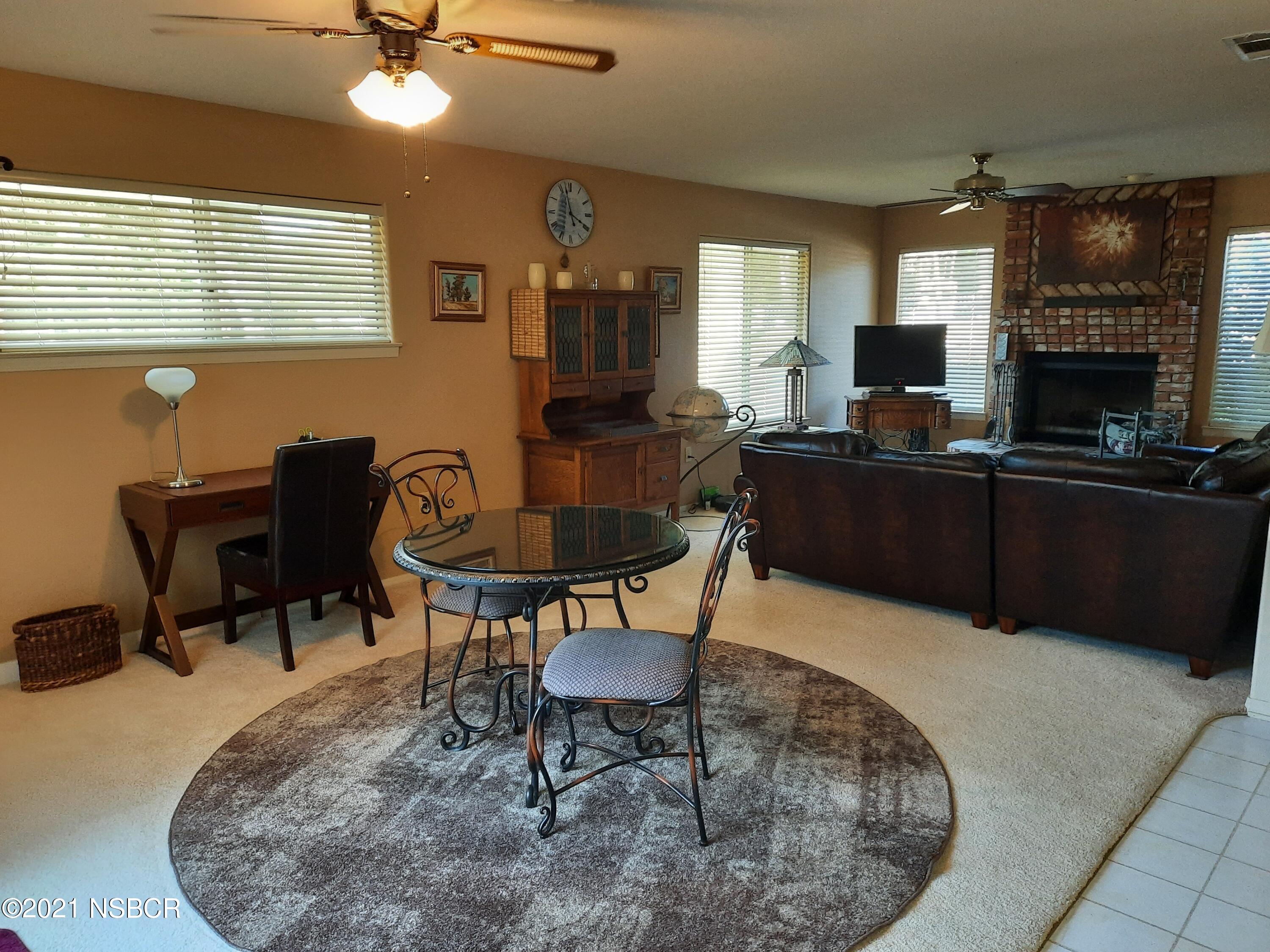 3165 Christopher Drive Lompoc, CA 93436 - Photo 11 of 52 a view of a livingroom with furniture and a fireplace