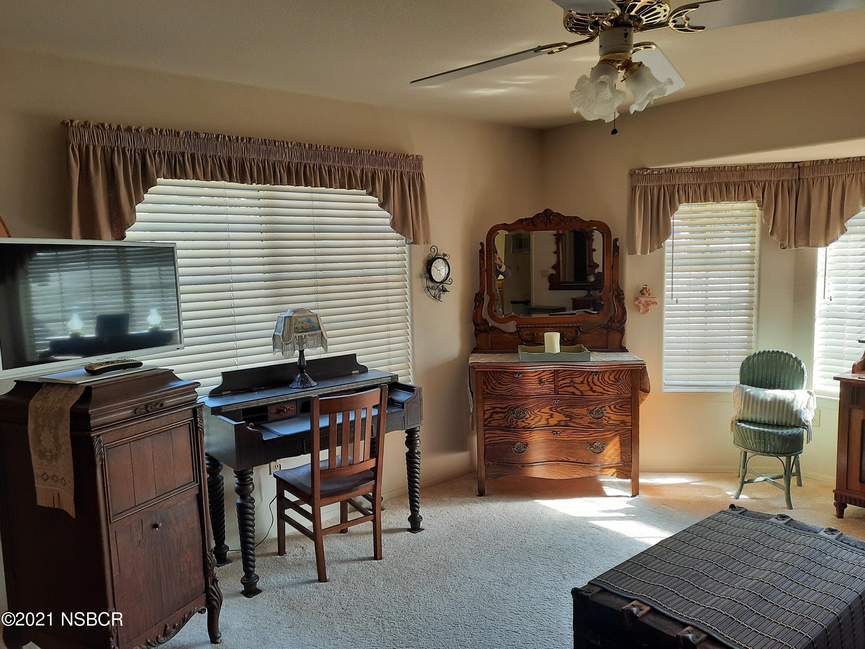 3165 Christopher Drive Lompoc, CA 93436 - Photo 33 of 52 a room with furniture and a flat screen tv