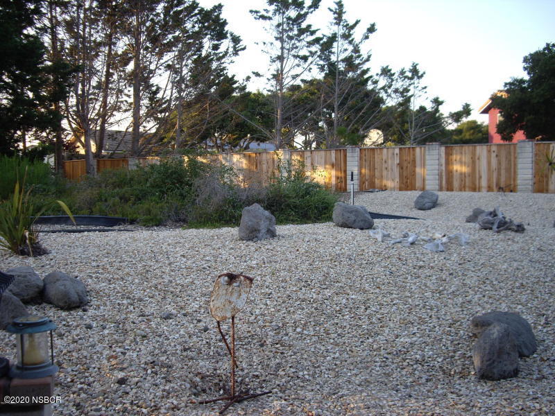 3165 Christopher Drive Lompoc, CA 93436 - Photo 4 of 52 a view of a backyard with trees