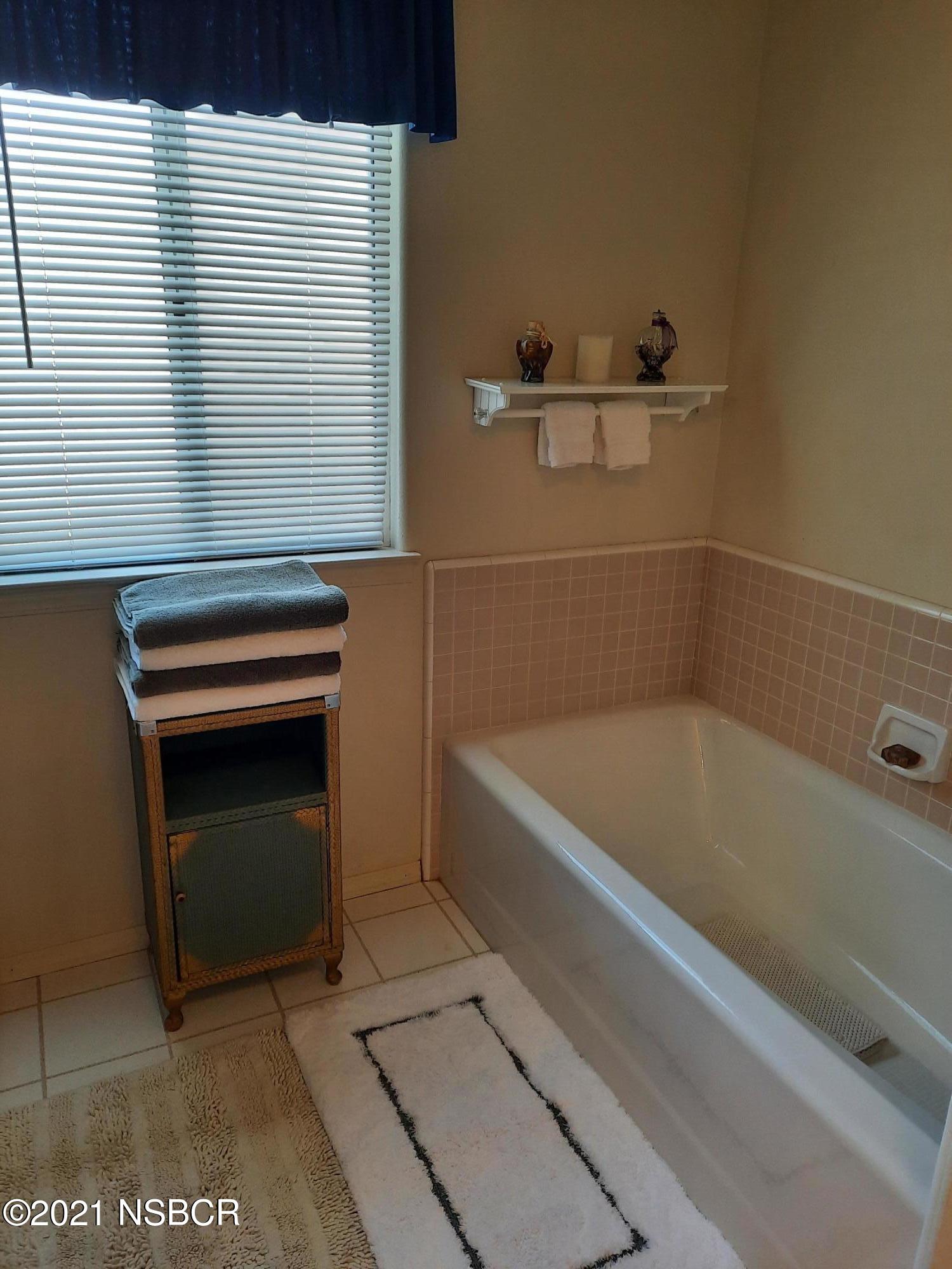 3165 Christopher Drive Lompoc, CA 93436 - Photo 43 of 52 a bathroom with a bathtub
