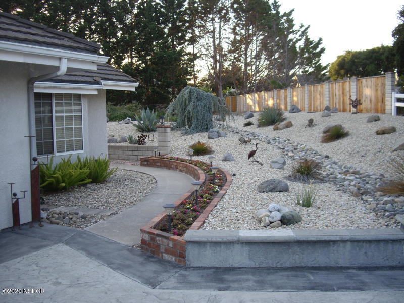 3165 Christopher Drive Lompoc, CA 93436 - Photo 48 of 52 a view of a yard with a house