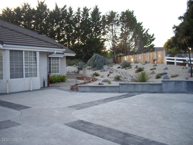 3165 Christopher Drive Lompoc, CA 93436 - Photo 49 of 52 a view of a house with a yard and large tree