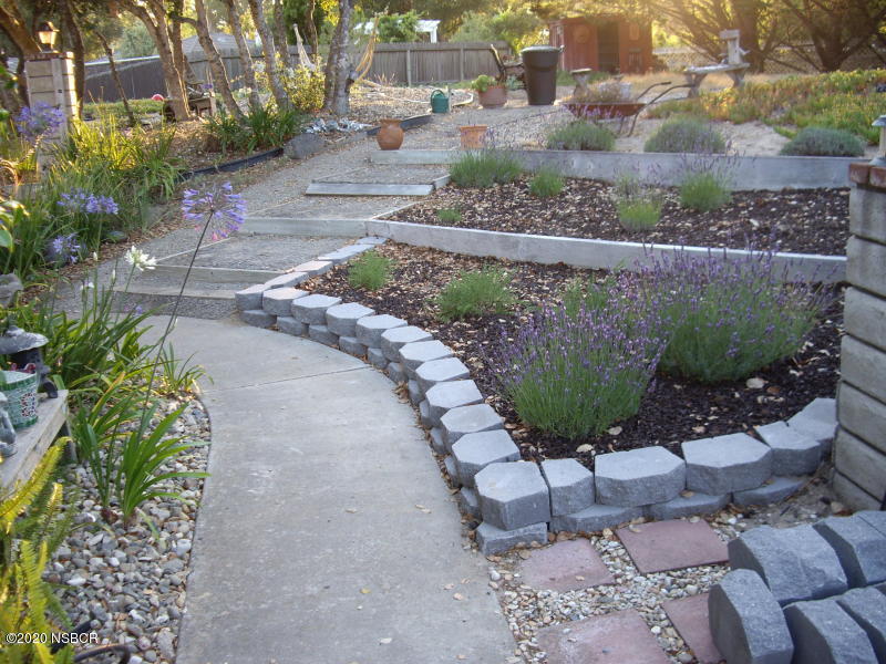 3165 Christopher Drive Lompoc, CA 93436 - Photo 6 of 52 a view of a garden with sitting area