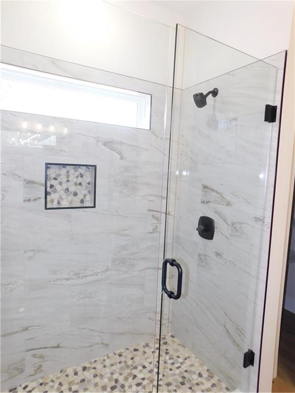 98 Elbert Gaddis Road Dahlonega, GA 30533 - Photo 22 of 38 a bathroom with a shower