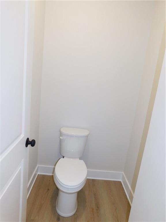98 Elbert Gaddis Road Dahlonega, GA 30533 - Photo 24 of 38 a white toilet sitting next to a shower