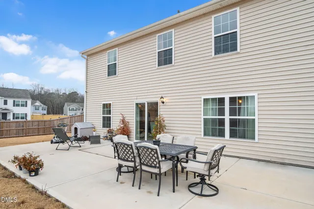 a view of a street with a building in the background