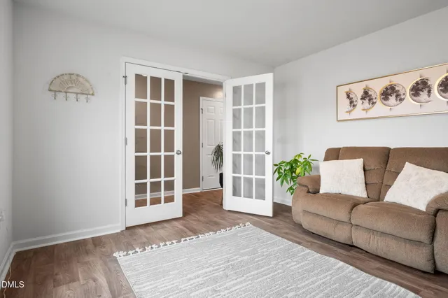 a bathroom with a sink toilet and a mirror