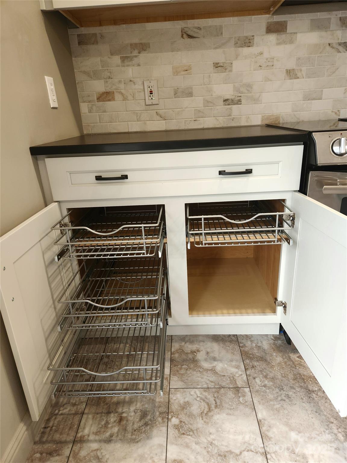 10 Tahchee Trail Fletcher, NC 28732 - Photo 11 of 48 a stove top oven sitting inside of a kitchen