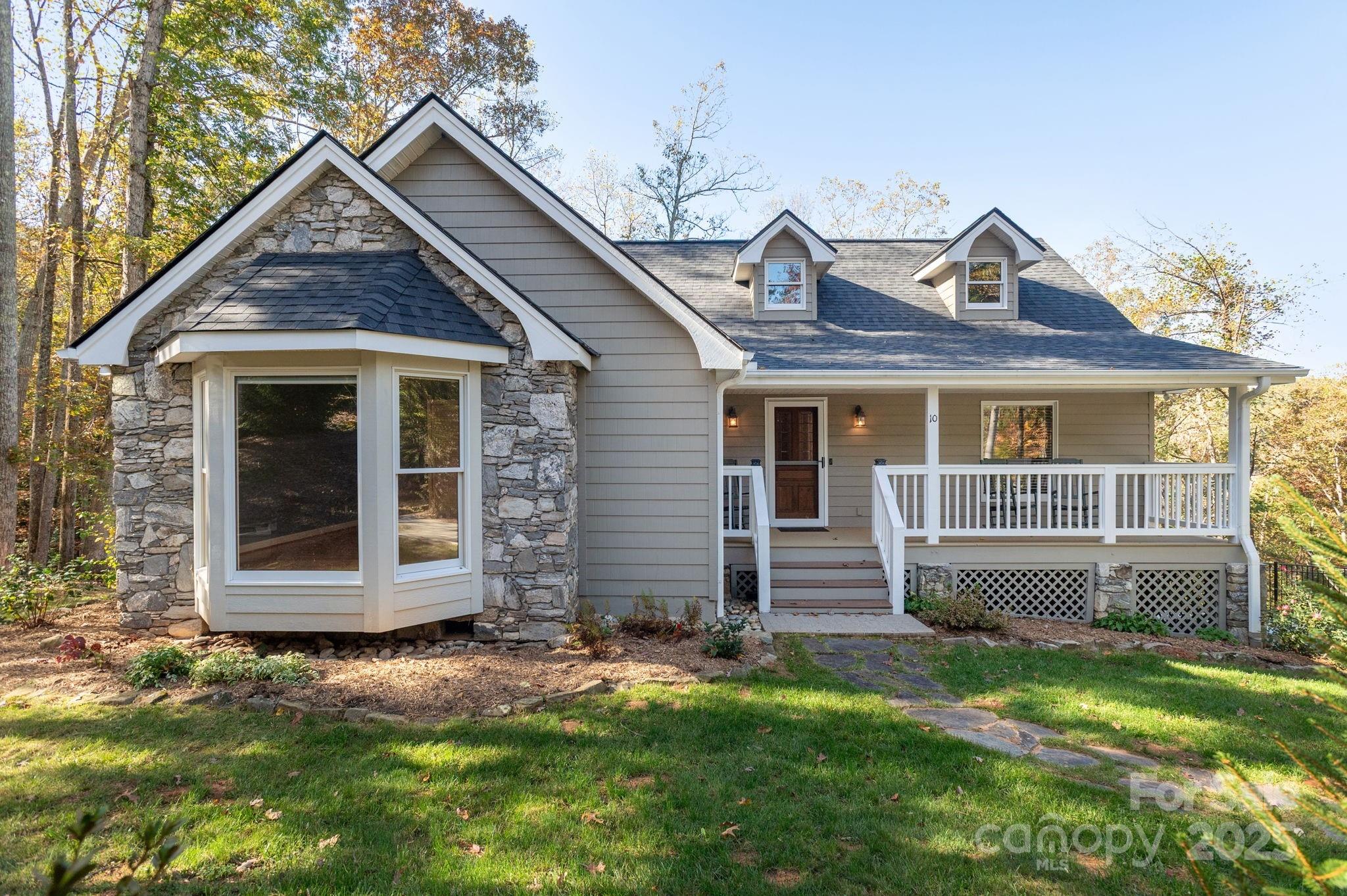 10 Tahchee Trail Fletcher, NC 28732 - Photo 2 of 48 a front view of a house with a yard