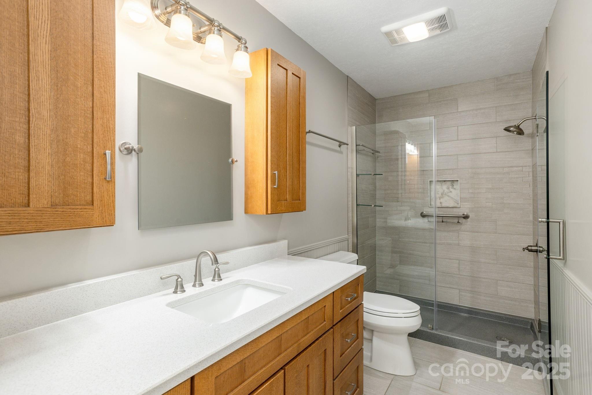10 Tahchee Trail Fletcher, NC 28732 - Photo 26 of 48 a bathroom with a sink toilet and shower