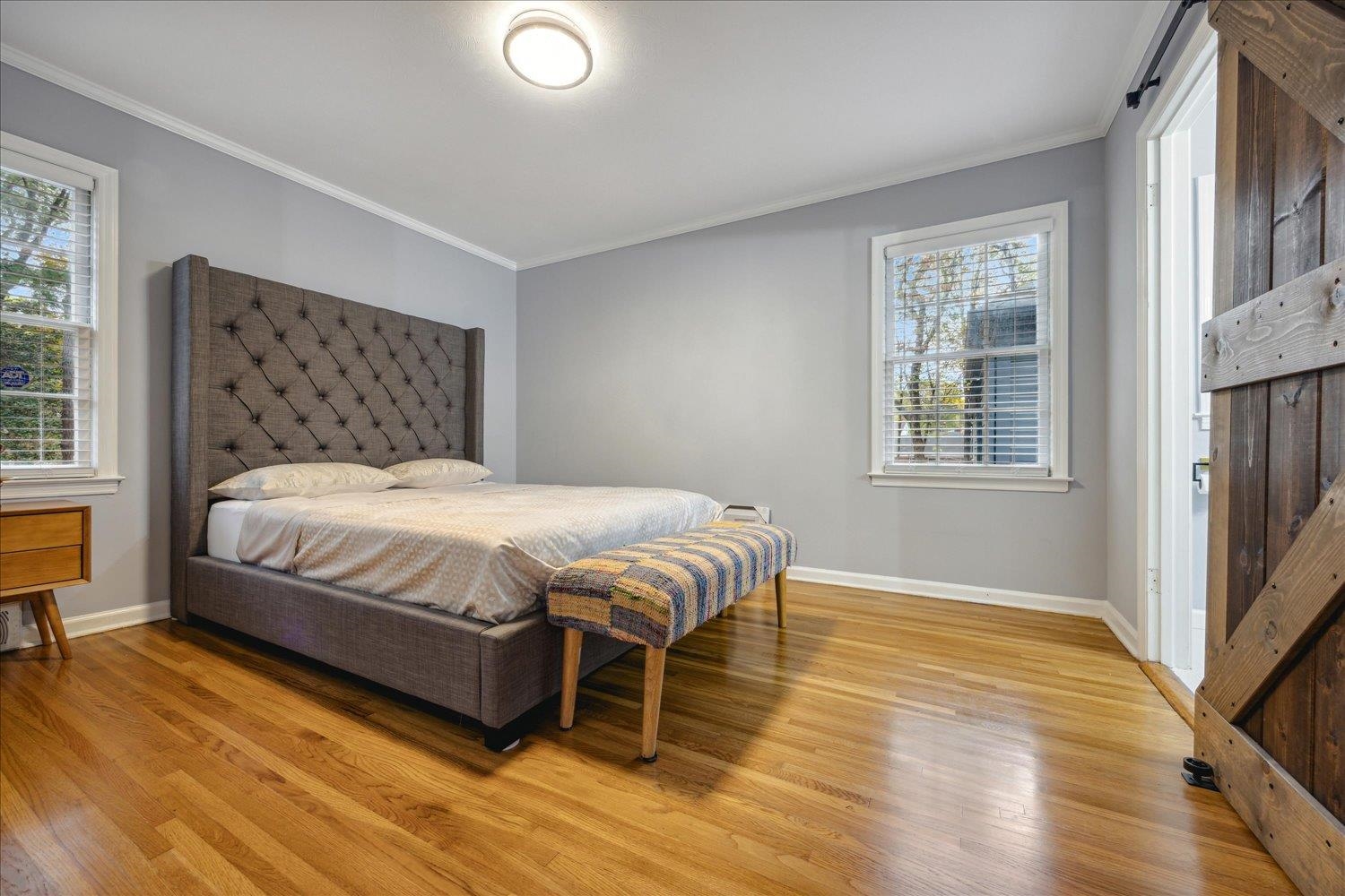 3076 Laurencekirk Road Memphis, TN 38128 - Photo 12 of 23 Bedroom featuring ornamental molding and light hardwood / wood-style flooring