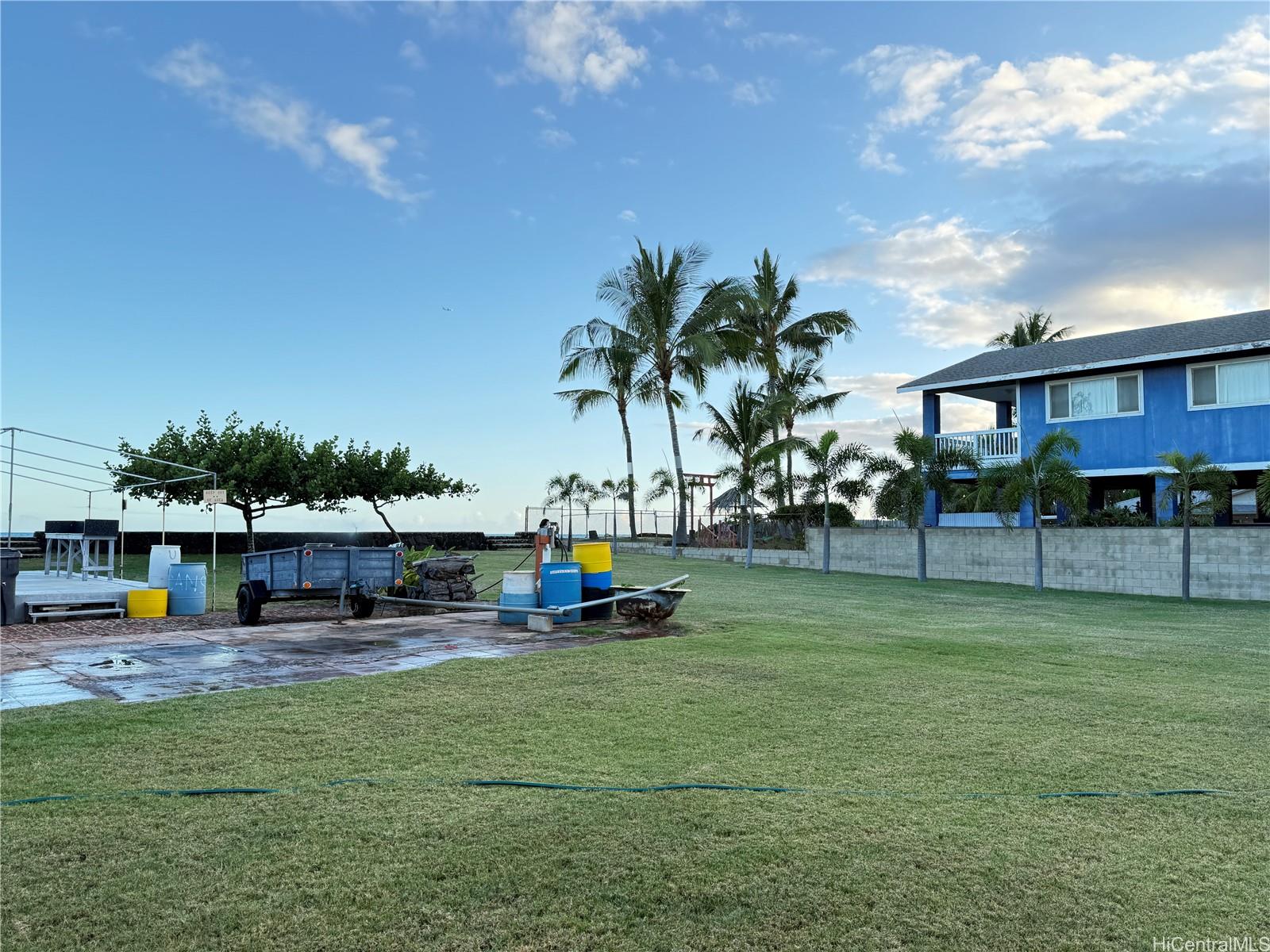 91-249 Ewa Beach Road Ewa Beach, HI 96706 - Photo 17 of 25 a childrens park with lots of swings and slides