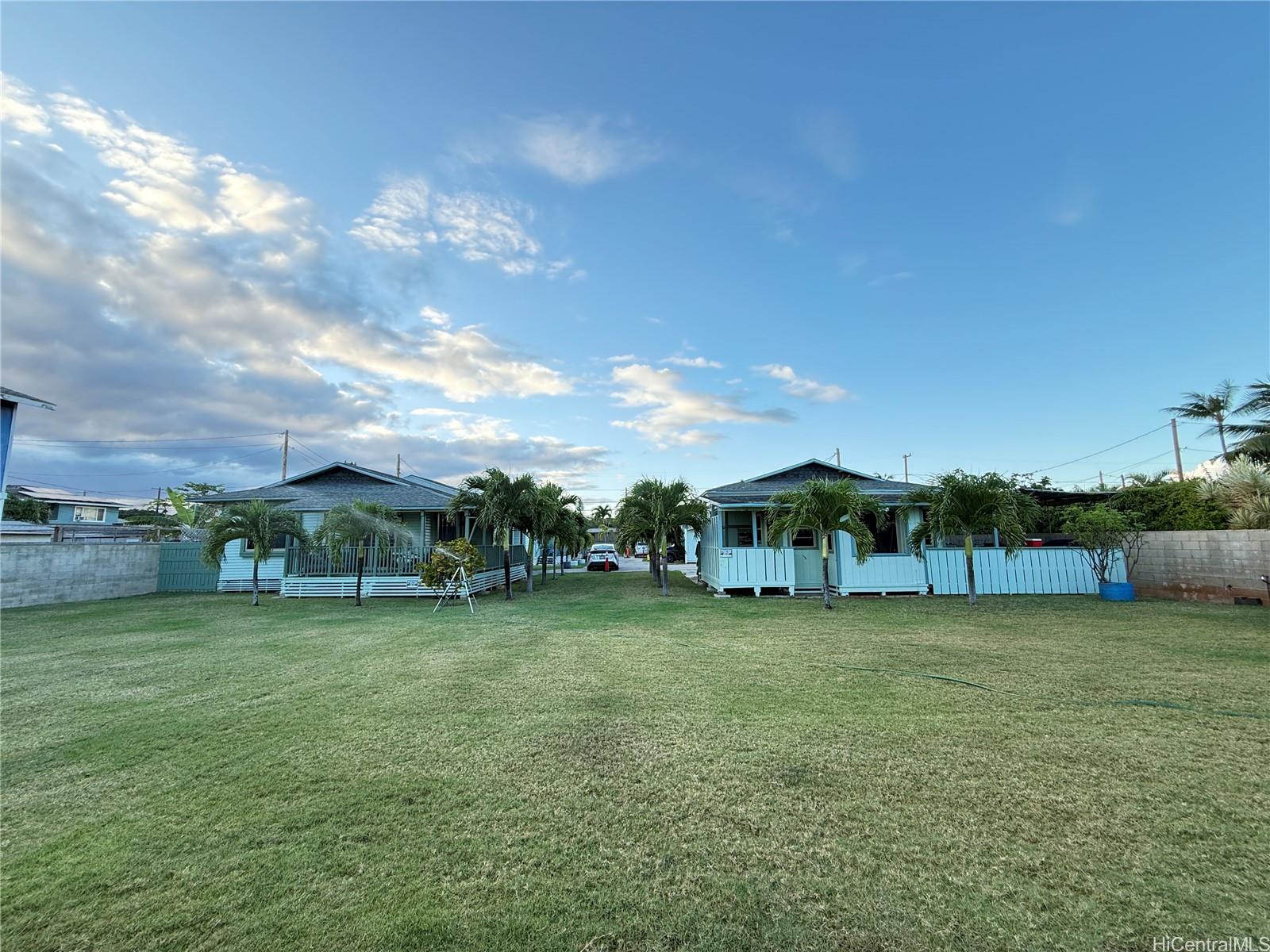 91-249 Ewa Beach Road Ewa Beach, HI 96706 - Photo 19 of 25 a view of a house with a big yard