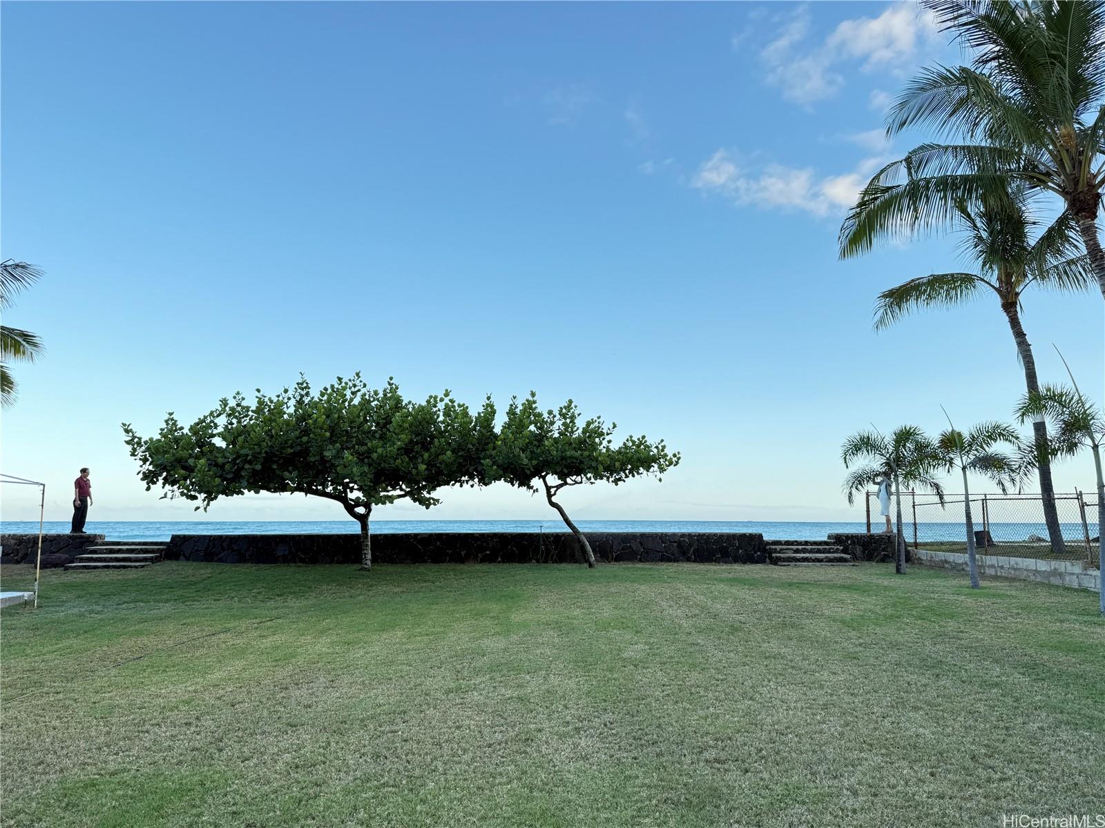 91-249 Ewa Beach Road Ewa Beach, HI 96706 - Photo 20 of 25 a view of swimming pool with a yard