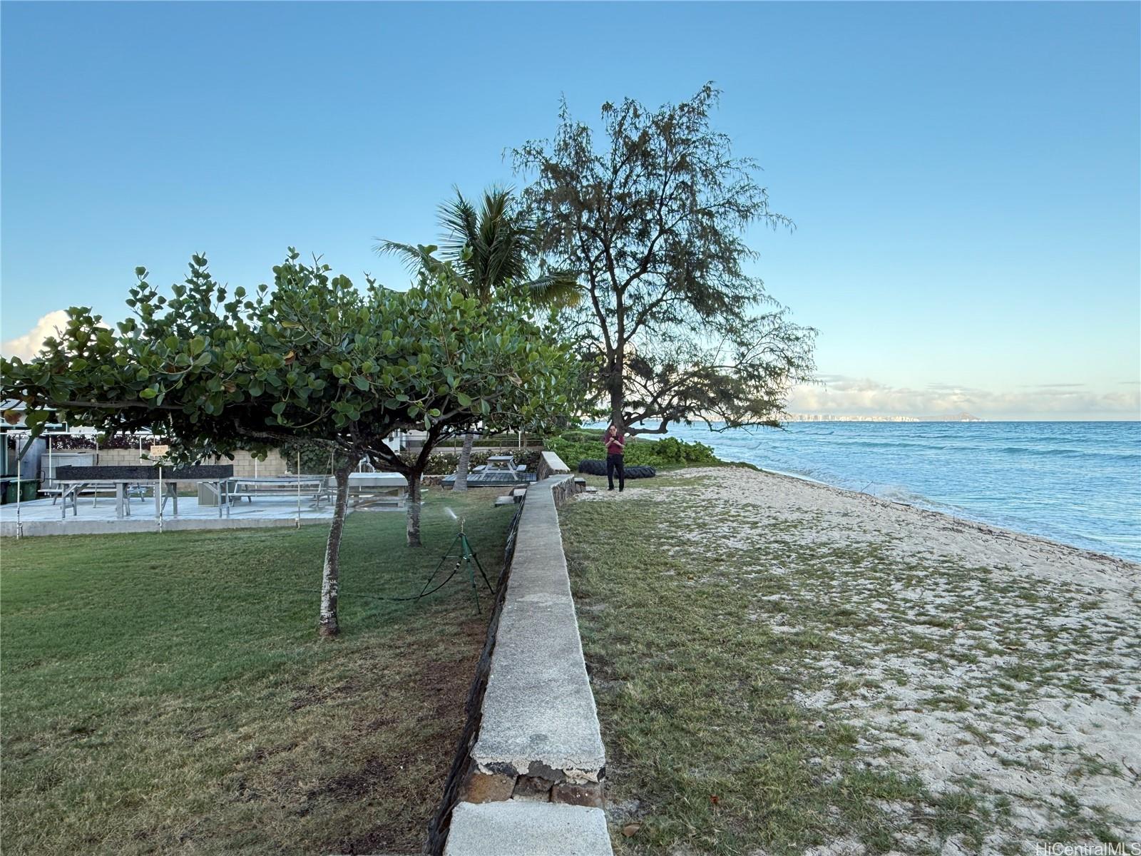91-249 Ewa Beach Road Ewa Beach, HI 96706 - Photo 25 of 25 a view of a lake with a yard