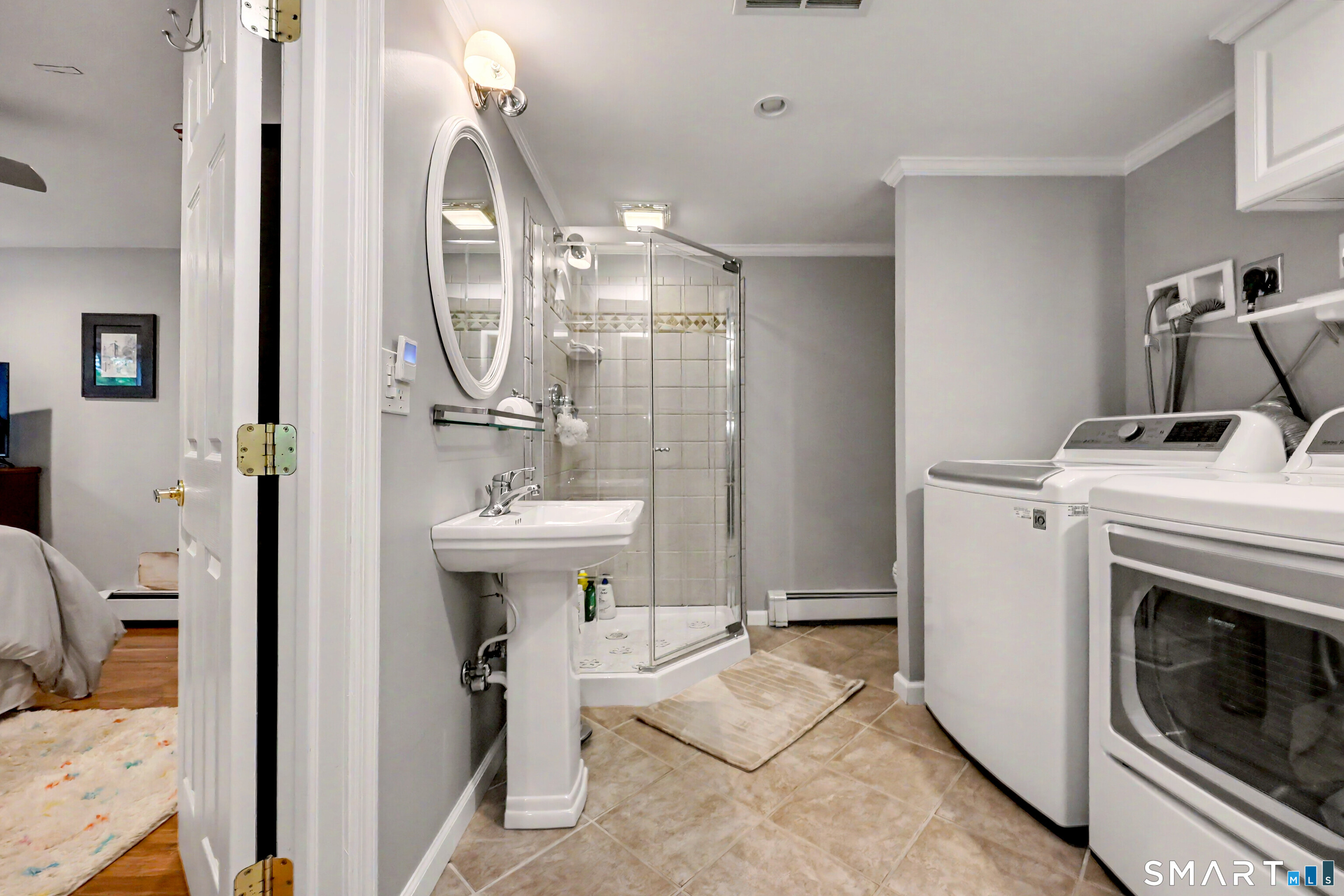 46 Todds Road Ridgefield, CT 06877 - Photo 28 of 35 Full bath and laundry round out the lower level.