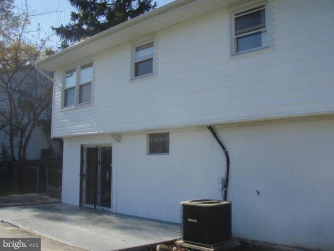 13031 Clarion Road Fort Washington, MD 20744 - Photo 21 of 25 patio-new AC unit and new siding