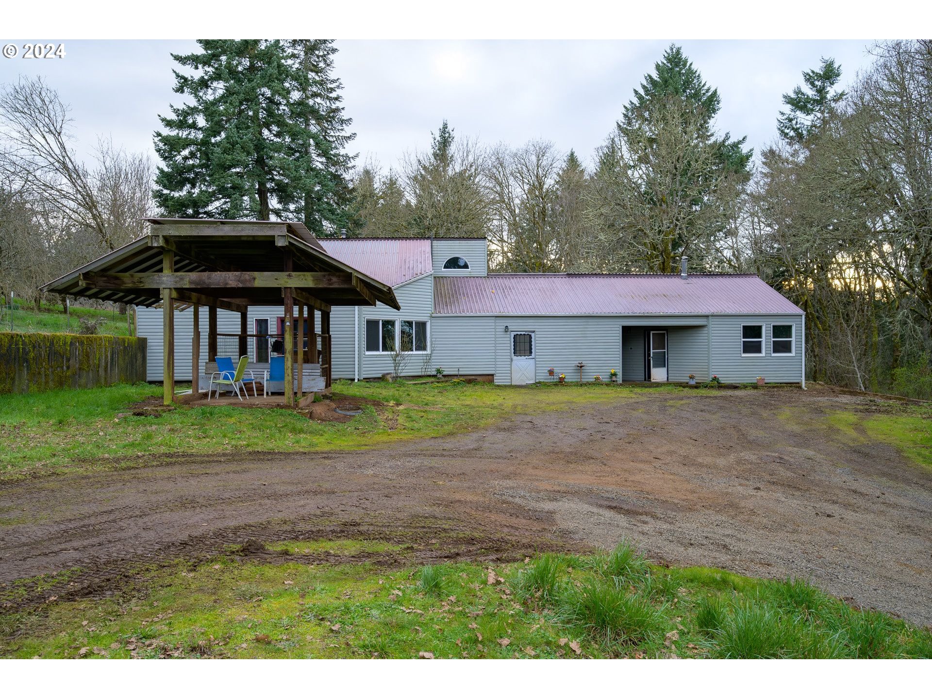 16850 Southeast Walnut Hill Road Amity, OR 97101 - Photo 2 of 47 a front view of a house with a yard