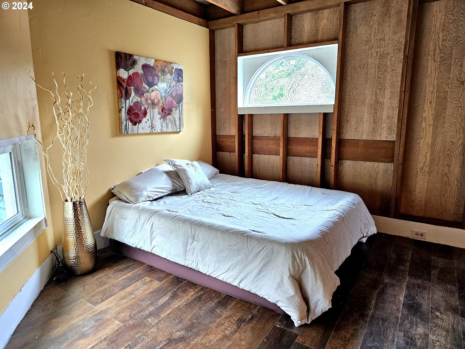 16850 Southeast Walnut Hill Road Amity, OR 97101 - Photo 25 of 47 a bedroom with a bed and wooden floor