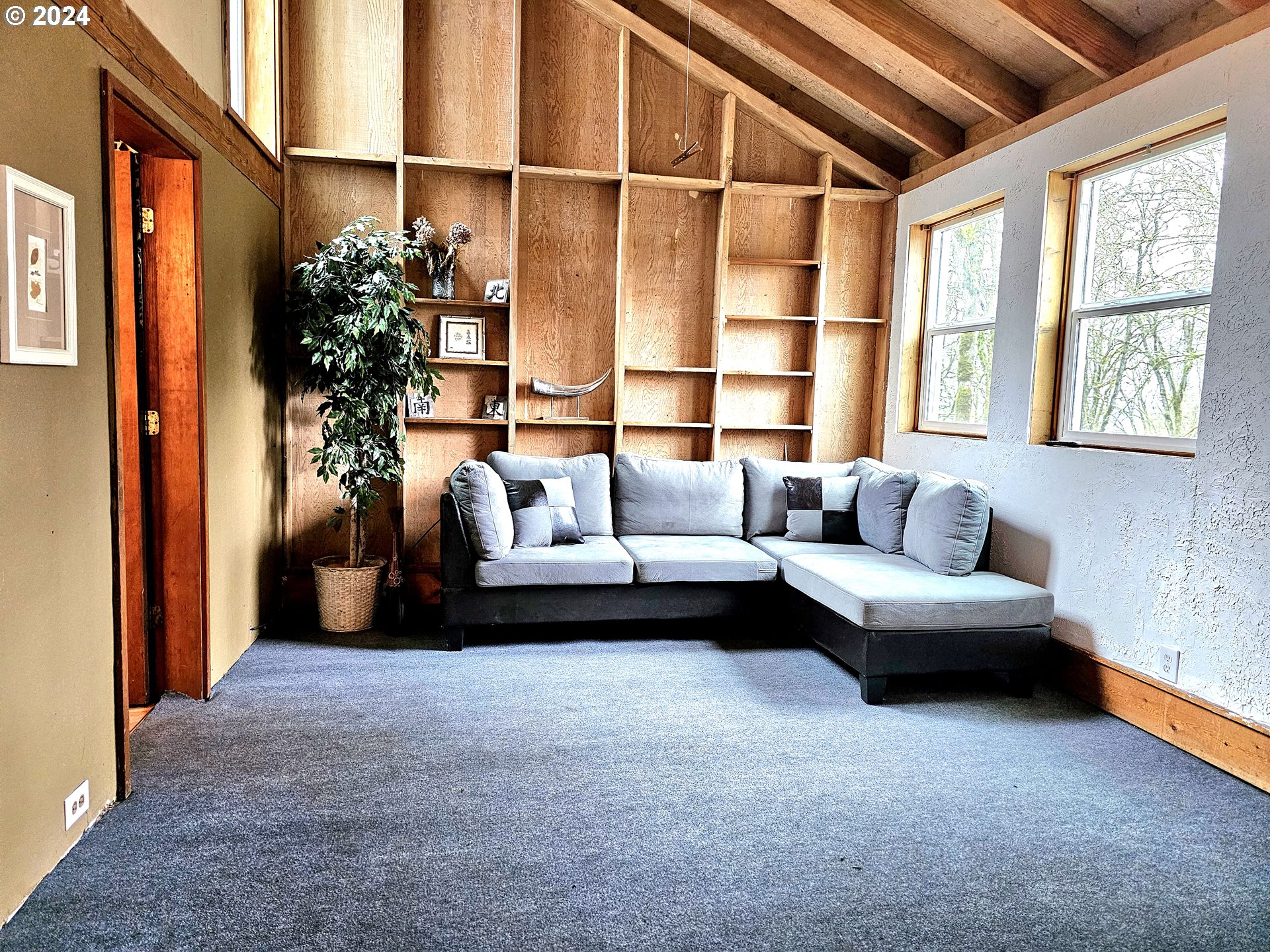 16850 Southeast Walnut Hill Road Amity, OR 97101 - Photo 29 of 47 a living room with furniture and a large window