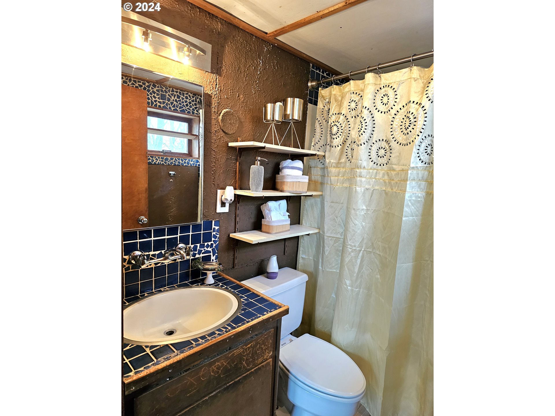 16850 Southeast Walnut Hill Road Amity, OR 97101 - Photo 34 of 47 a bath room with a sink and a toilet