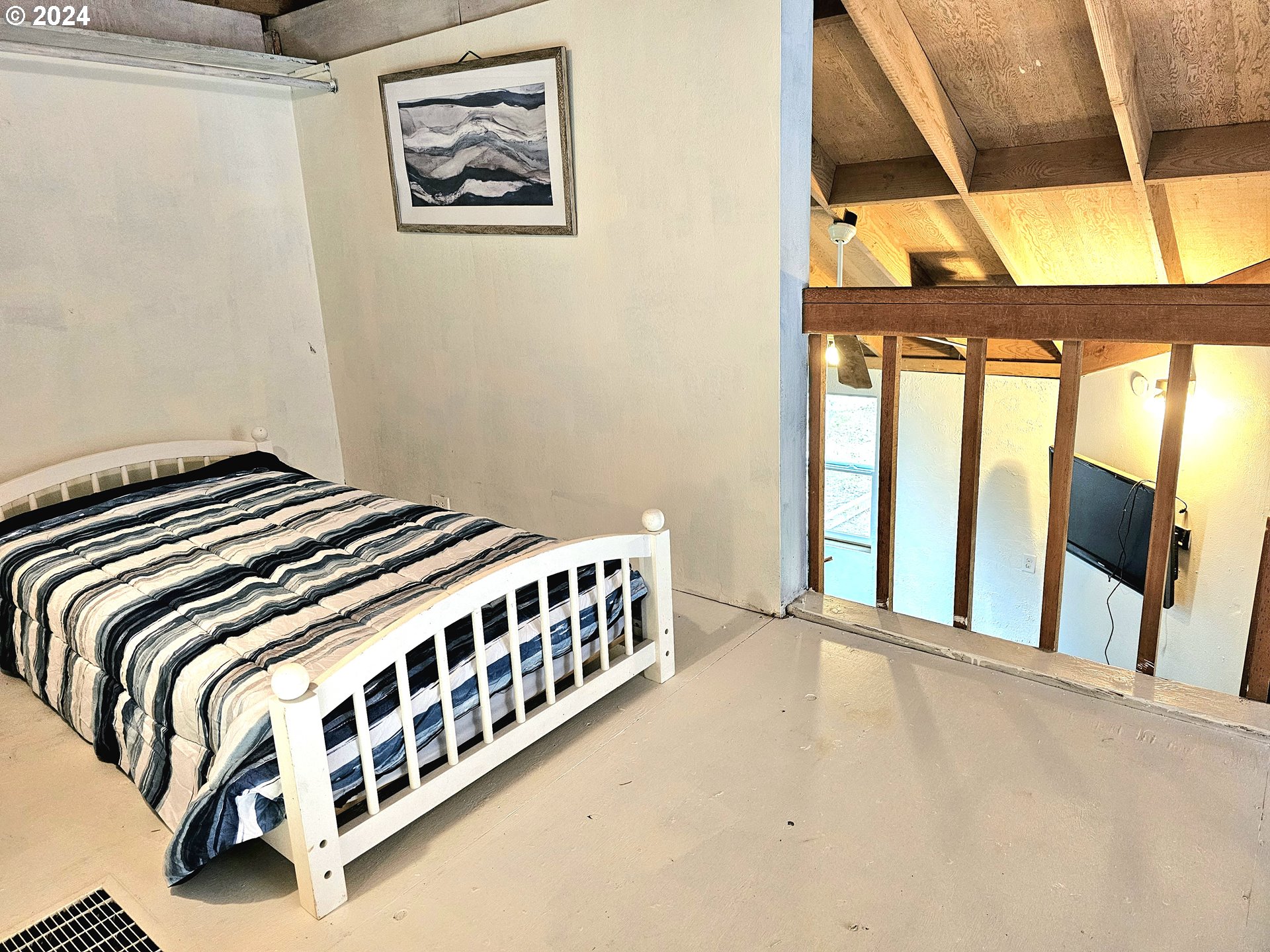16850 Southeast Walnut Hill Road Amity, OR 97101 - Photo 35 of 47 a bedroom with a bed and a window